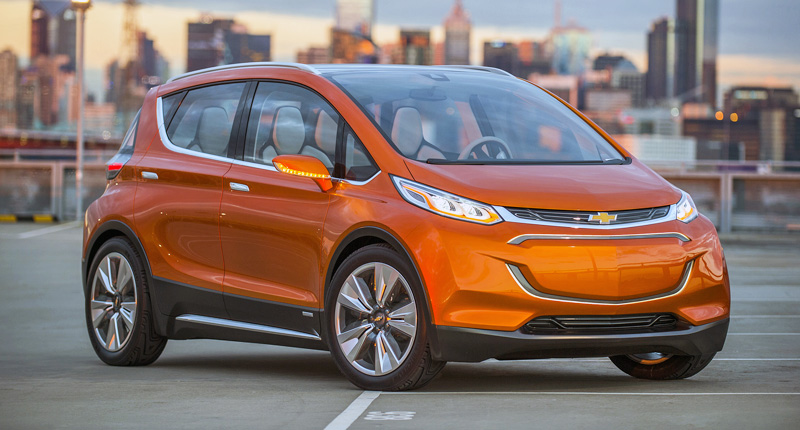 2015 Chevrolet Bolt EV Concept all electric vehicle. Front ¾ in city scape. Bolt EV Concept builds upon Chevy’s experience gained from both the Volt and Spark EV to make an affordable, long-range all-electric vehicle to market. The Bolt EV is designed to meet the daily driving needs of Chevrolet customers around the globe with more than 200 miles of range and a price tag around $30,000.