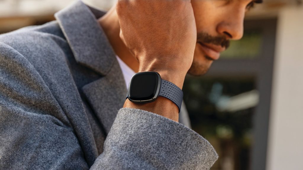 Lifestyle photo of Fitbit Sense.