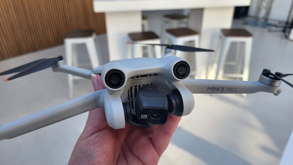 dji mini pro 3 drone in hand