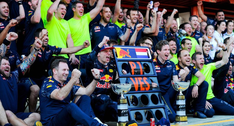 Max Verstappen celebrating with Red Bull Racing.